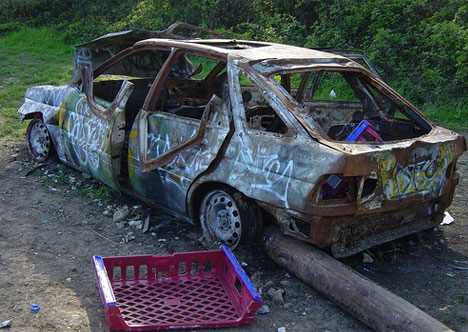 abandoned burned out car