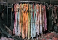 Chris Jordan - In Katrina's Wake - clothing store rack