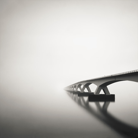 black white bridge fog