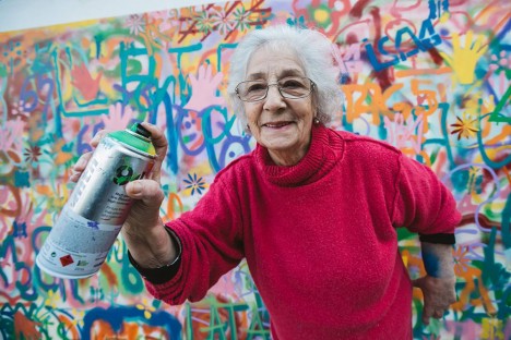 elderly spray paint woman